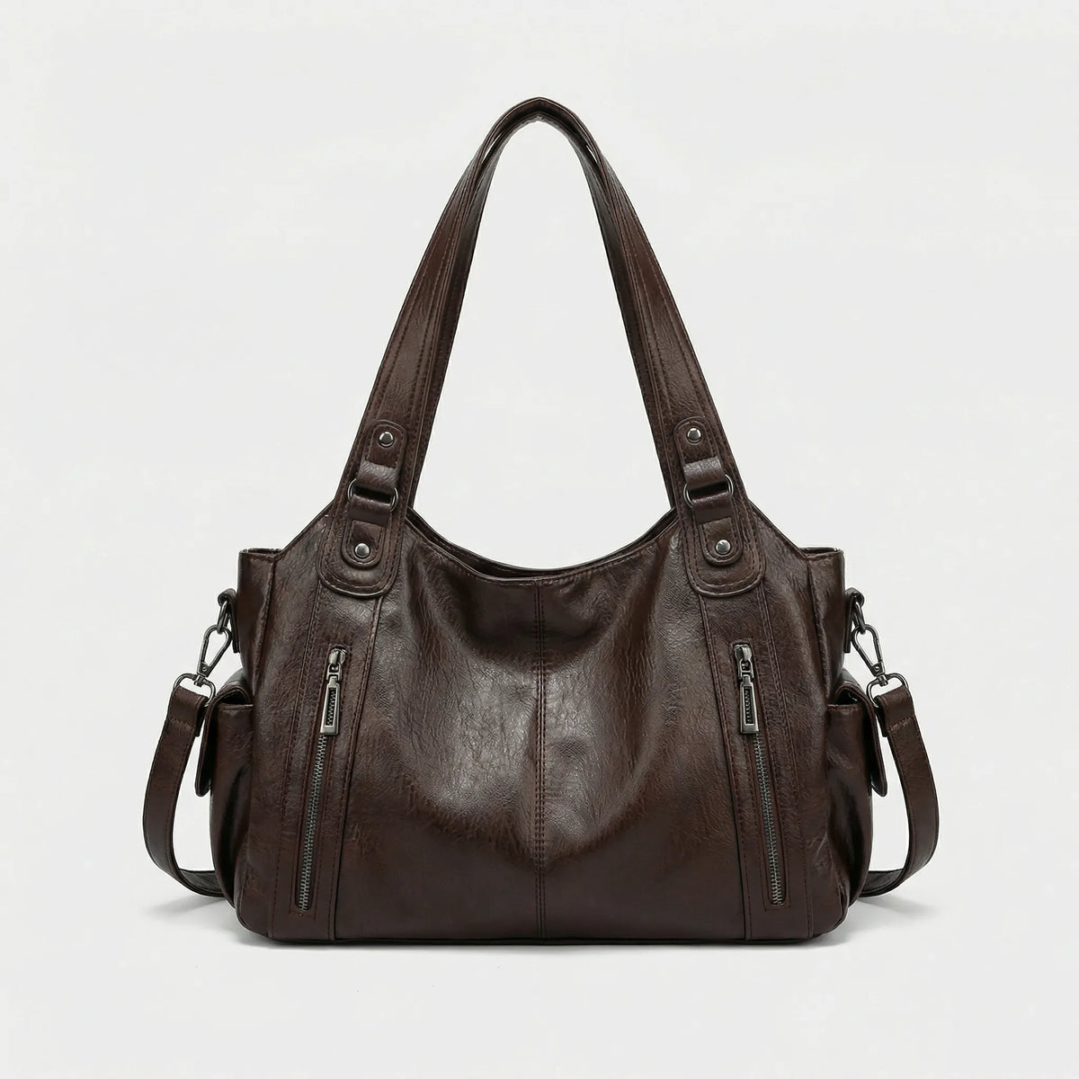 Sanna | Crossbody väska för dam i konstläder, svart - Brun